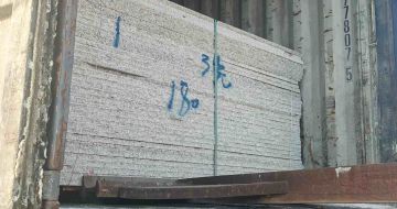 烟台 芝麻白花岗岩石材3.0公分光面毛板装柜出货