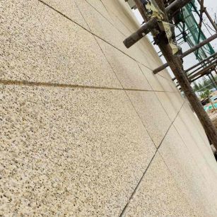 烟台 黄金麻花岗岩荔枝面外墙干挂石材效果示例