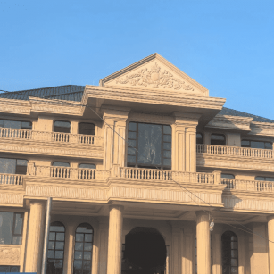 烟台黄金麻别墅外墙干挂石材效果示例