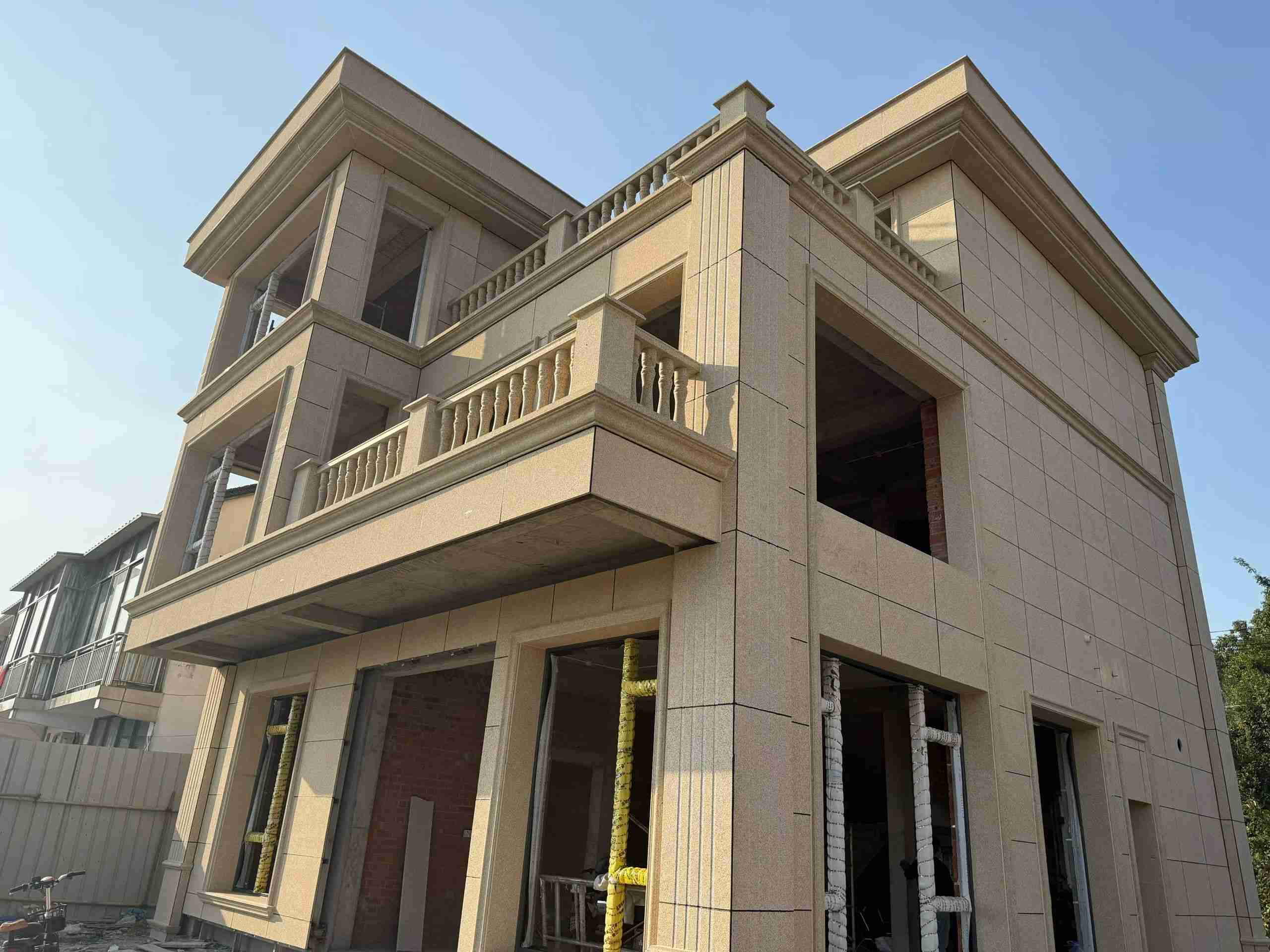 烟台 黄金麻花岗岩石材荔枝面外墙干挂效果展示